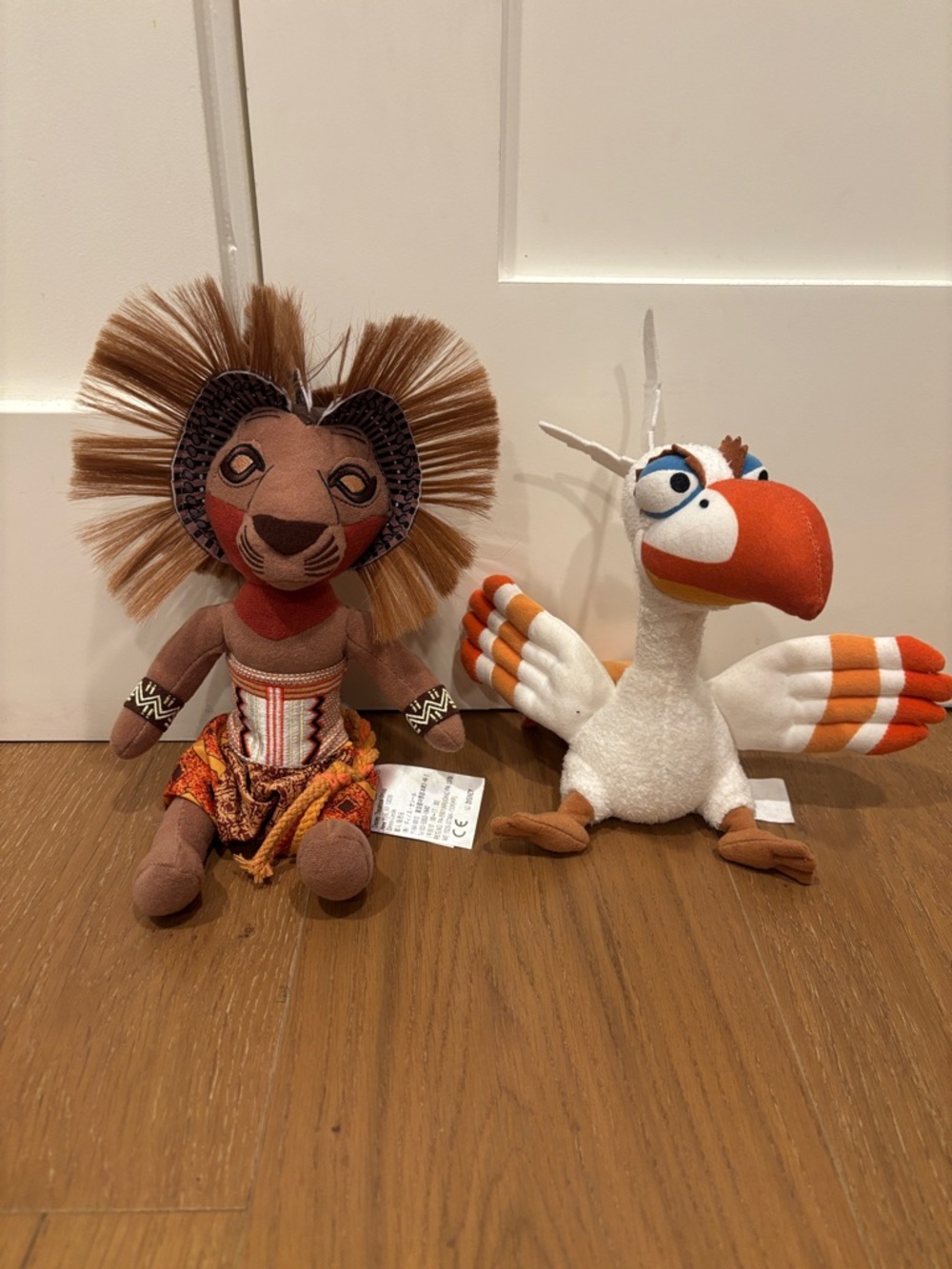 Disney Plush Pair - Brown Lion and White Orange Tropical Bird